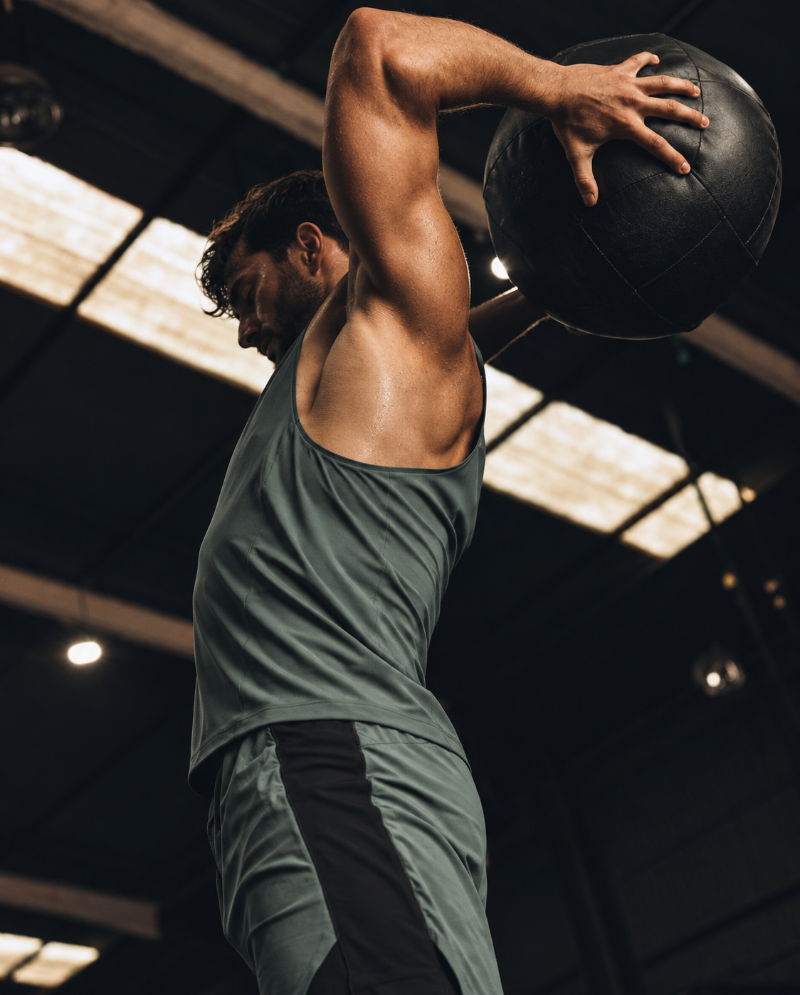 Athlete training with a medicine ball