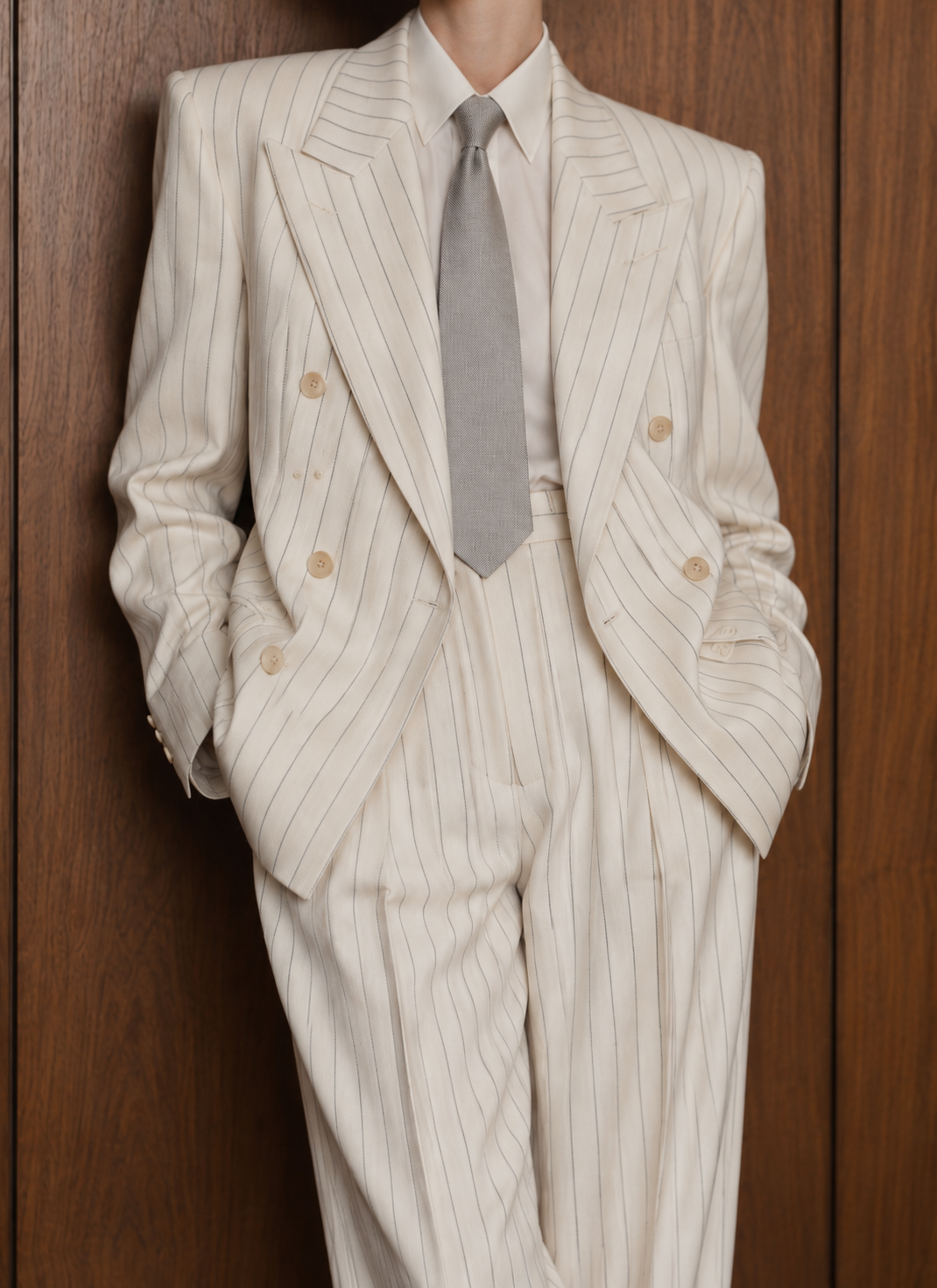 Ivory pinstripe tailoring detail without visible face
